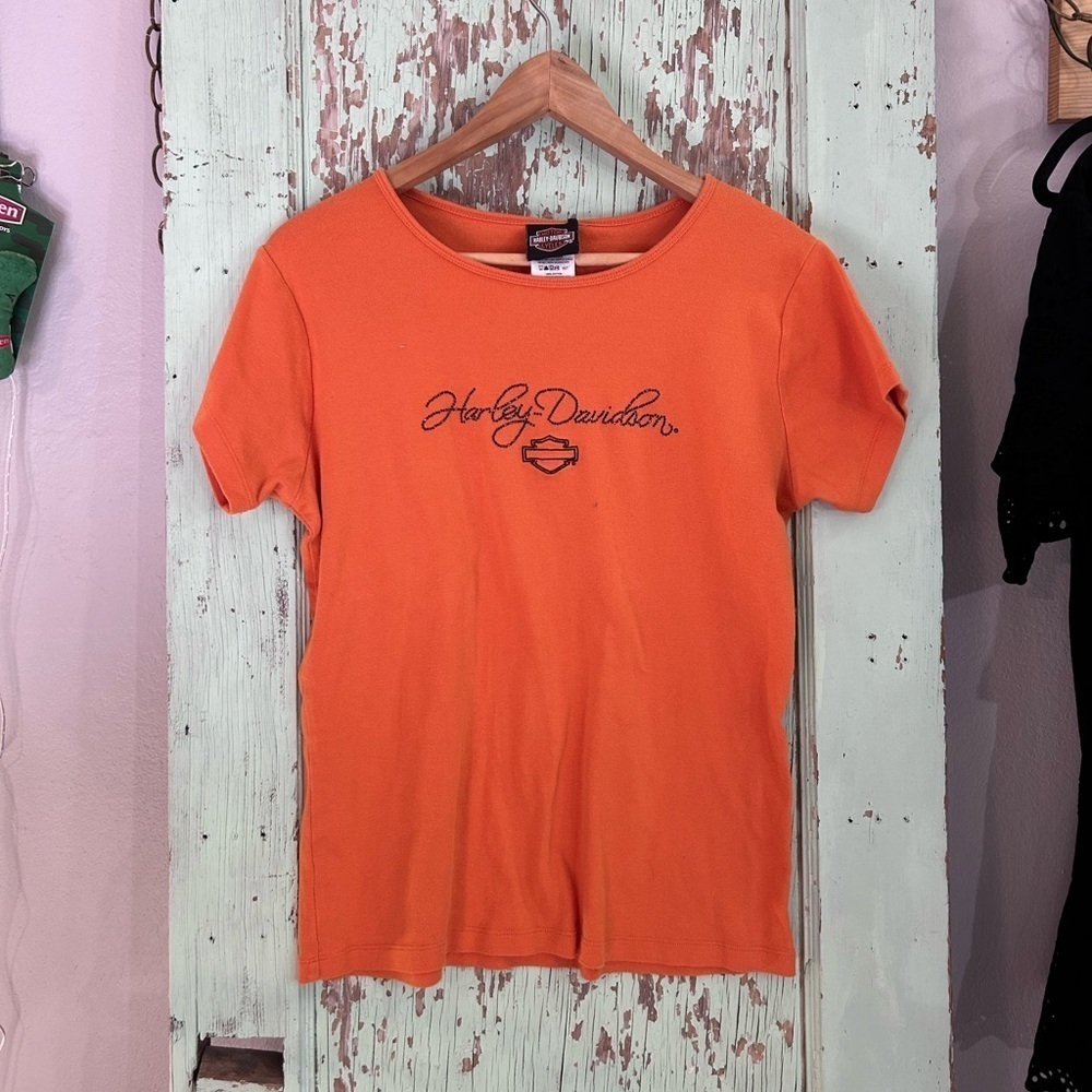Women’s Harley Davidson orange t-shirt with black rhinestone logo